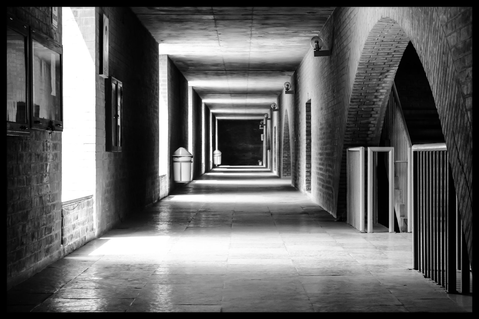 black and white image of a lobby in IIM Ahmedabad captured by Jainish Soni